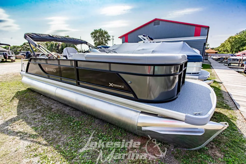 Slide: The Image of 2026 Godfrey Sweetwater 2286 SFLX pontoon boat displayed outdoors. - 3