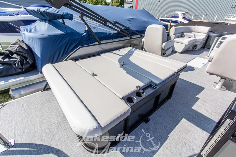 Slide: The Image of 2026 Godfrey Sweetwater 2286 SFLX pontoon boat interior with seating and cup holders. - 30