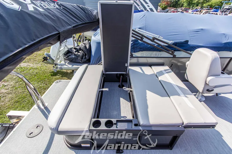 Slide: The Image of 2026 Godfrey Sweetwater 2286 SFLX pontoon boat interior with seating and storage. - 31