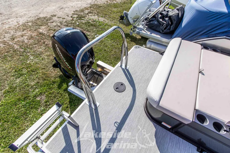 Slide: The Image of 2026 Godfrey Sweetwater 2286 SFLX pontoon boat with Mercury outboard motor and swim platform. - 33