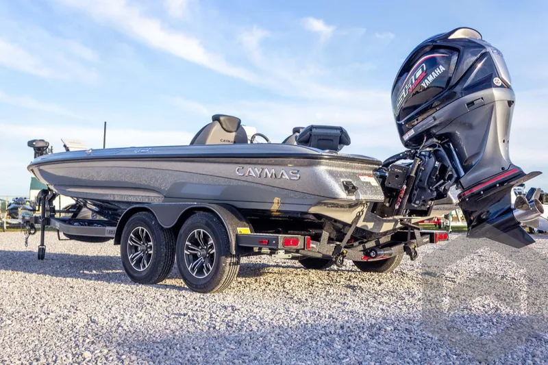 Slide: The Image of 2026 Caymas CX 21 PRO boat with Yamaha engine on a gravel surface. - 15