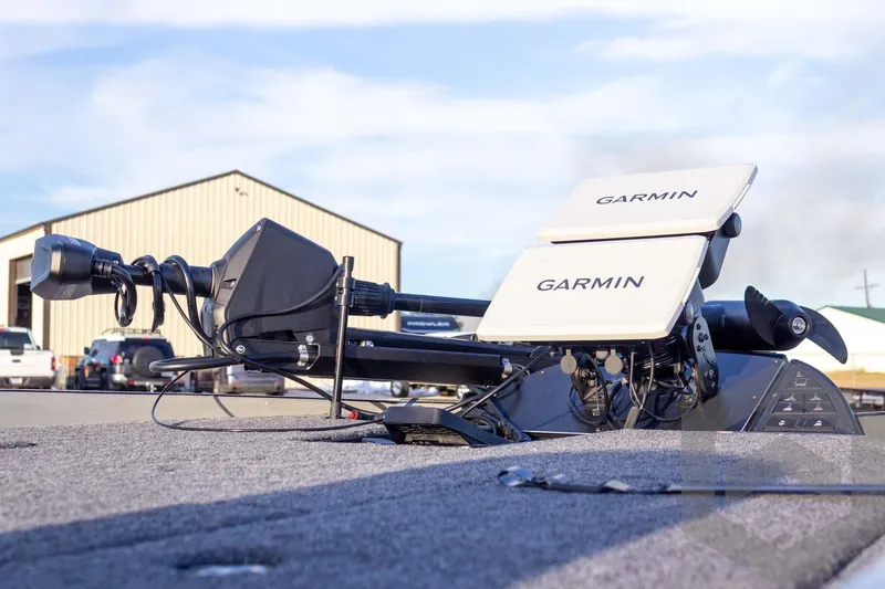 Slide: The Image of 2026 Caymas CX 21 PRO boat with Garmin equipment on deck, outdoor setting. - 18