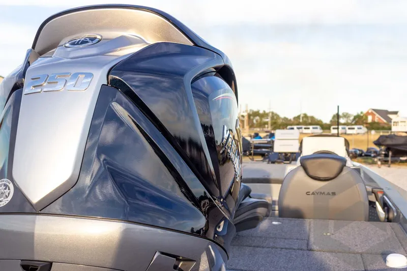 Slide: The Image of 2026 Caymas CX 21 PRO boat with powerful 250 engine, sleek design. - 22