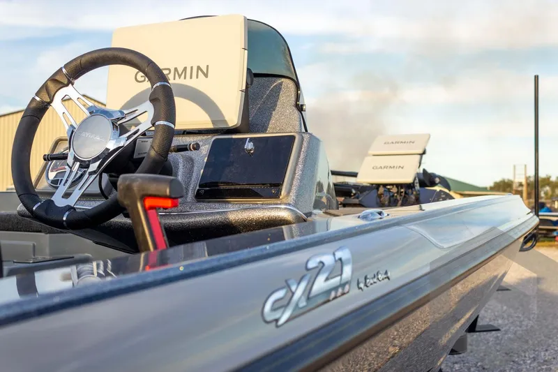 Slide: The Image of 2026 Caymas CX 21 PRO boat with Garmin electronics and sleek design. - 26