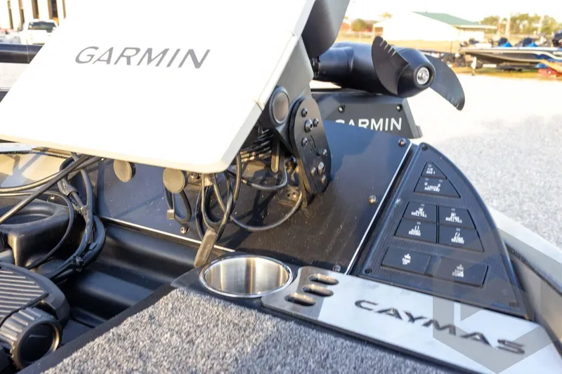 Slide: The Image of 2026 Caymas CX 21 PRO boat dashboard with Garmin electronics and control panel. - 34