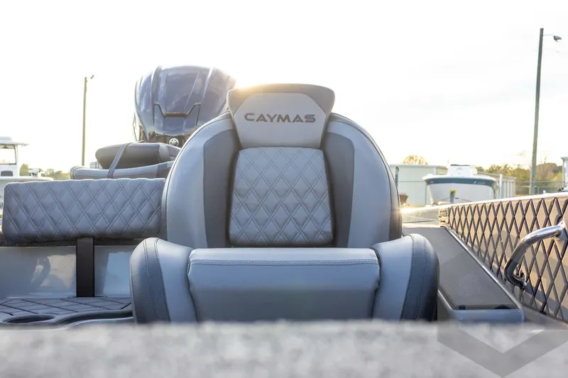 Slide: The Image of 2026 Caymas CX 21 PRO boat seat with diamond stitching and logo, rear view. - 40