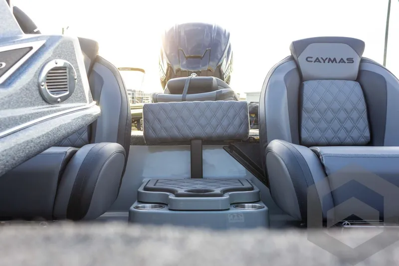Slide: The Image of 2026 Caymas CX 21 PRO boat interior with cushioned seats and modern design. - 41