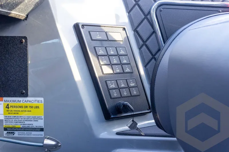 Slide: The Image of Control panel of 2026 Caymas CX 21 PRO boat with capacity label. - 45