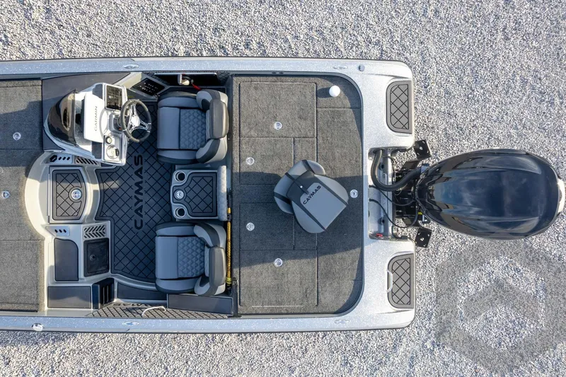 Slide: The Image of 2026 Caymas CX 21 PRO boat interior, top view, featuring seating and motor. - 56