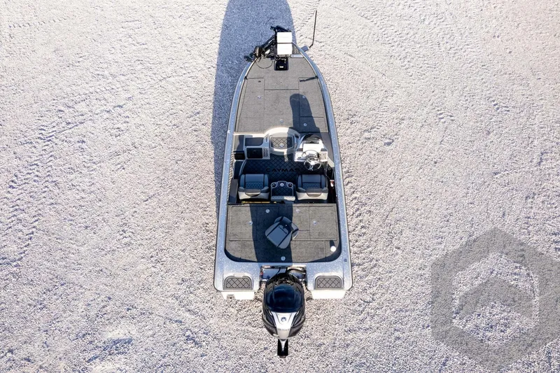 Slide: The Image of 2026 Caymas CX 21 PRO boat on gravel, aerial view showcasing deck layout. - 61
