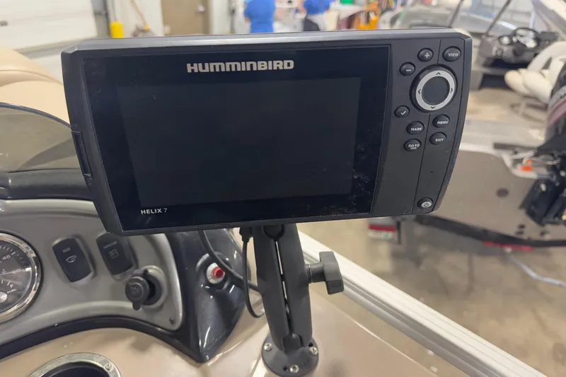 Slide: The Image of Humminbird Helix 7 fish finder on 2020 Sun Tracker SportFish 22 XP3 boat dashboard. - 12