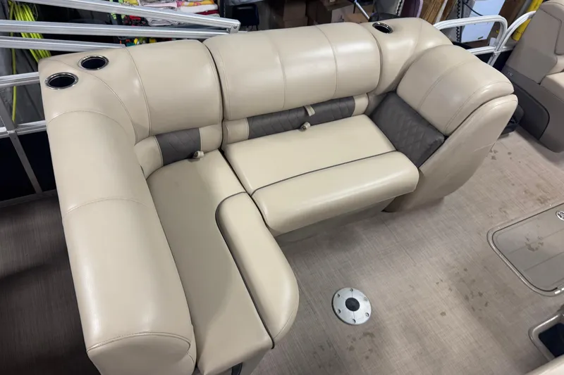 Slide: The Image of 2020 Sun Tracker SportFish 22 XP3 boat interior with beige cushioned seating. - 17
