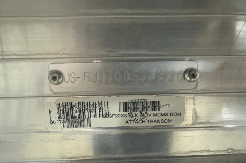 Slide: The Image of 2020 Sun Tracker SportFish 22 XP3 boat identification plate with serial number and barcode. - 6