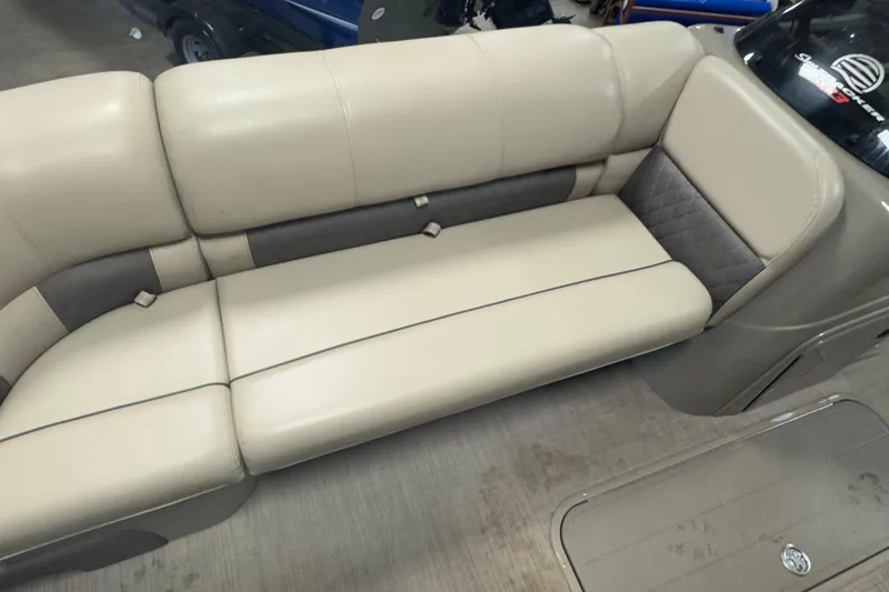 Slide: The Image of 2020 Sun Tracker SportFish 22 XP3 boat interior seating, beige and gray upholstery. - 8