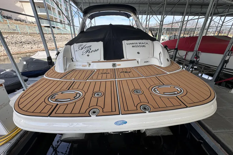 Slide: The Image of 2003 Sea Ray 290 Bowrider docked, featuring teak deck, located in Sunrise Beach, Missouri. - 19