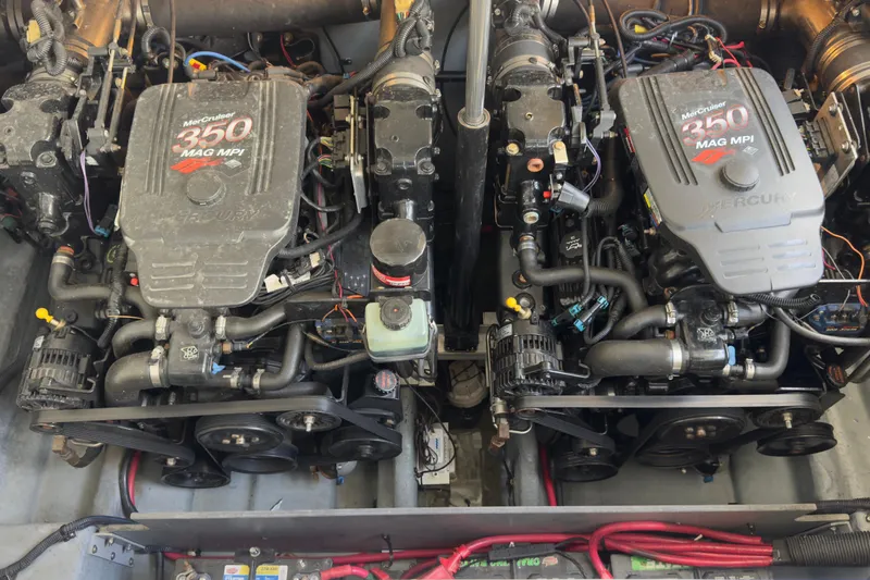 Slide: The Image of Twin MerCruiser 350 MAG MPI engines in a 2003 Sea Ray 290 Bowrider boat. - 20