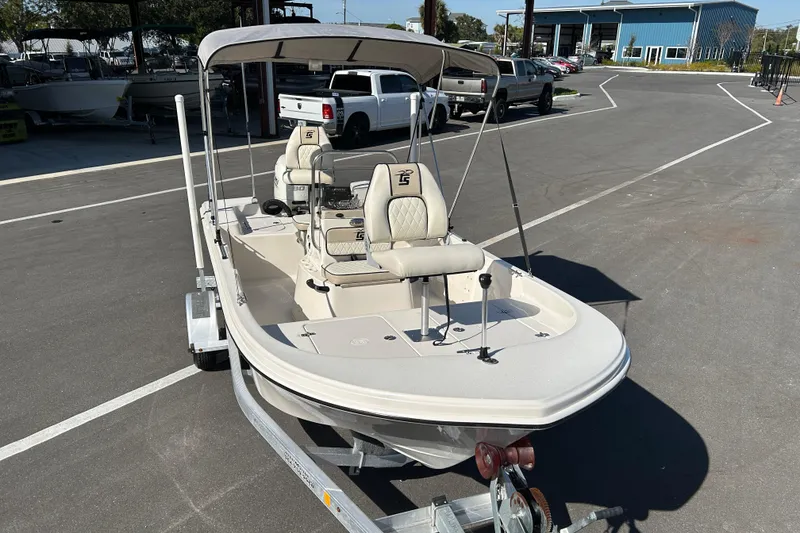 Slide: The Image of 2020 Carolina Skiff 162 JLS boat on trailer in parking lot. - 6