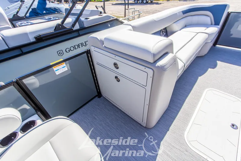 Slide: The Image of Interior of 2026 Godfrey Sweetwater 2286 SB pontoon boat with plush seating. - 13