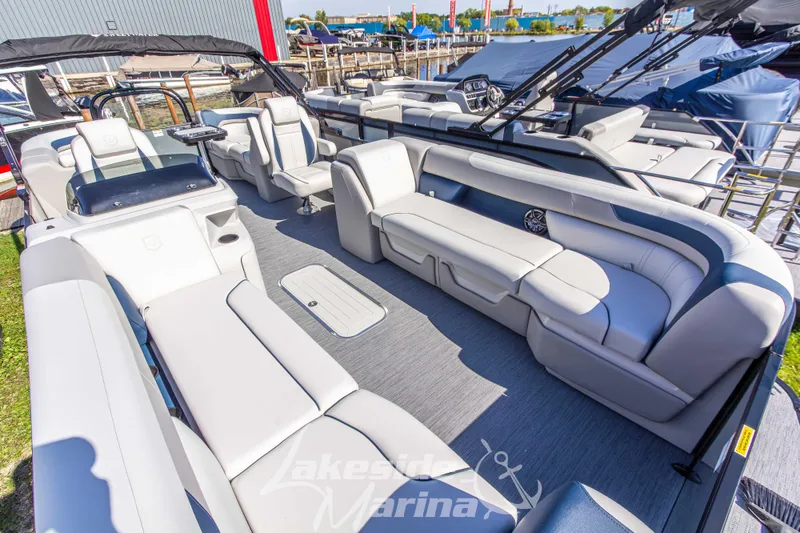 Slide: The Image of 2026 Godfrey Sweetwater 2286 SB pontoon boat with spacious seating and modern design. - 5