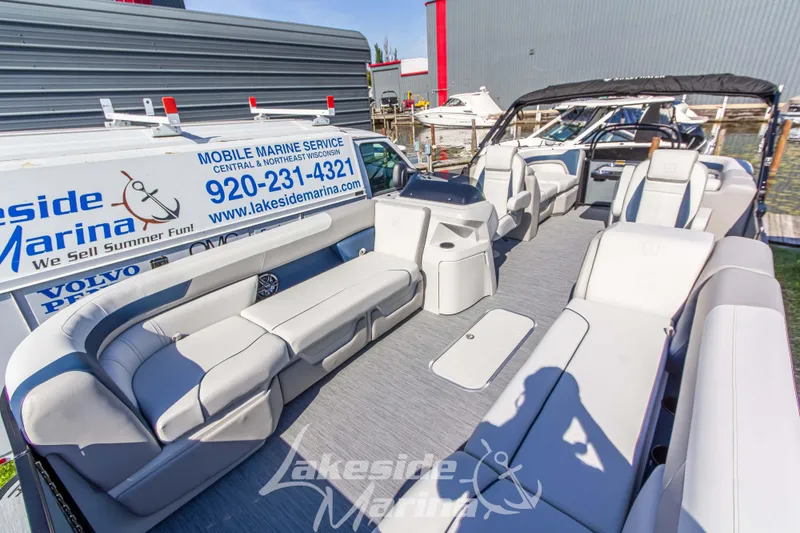 Slide: The Image of 2026 Godfrey Sweetwater 2286 SB pontoon boat with spacious seating at Lakeside Marina. - 6