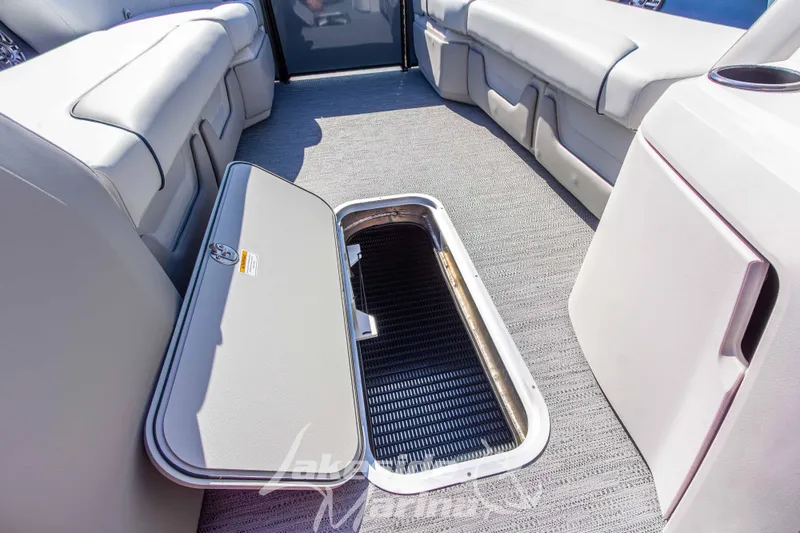 Slide: The Image of 2026 Godfrey Sweetwater 2286 SB boat interior with open storage compartment. - 9
