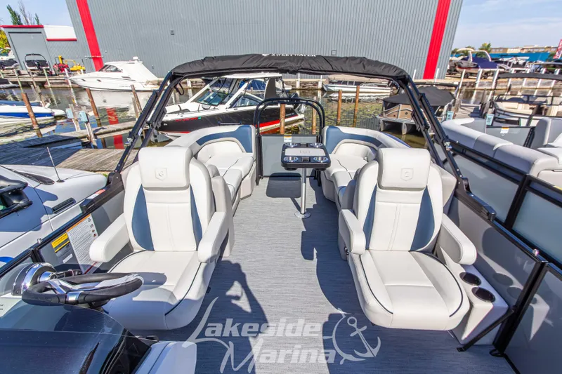 Slide: The Image of 2026 Godfrey Sweetwater 2286 SB pontoon boat interior at Lakeside Marina. - 11