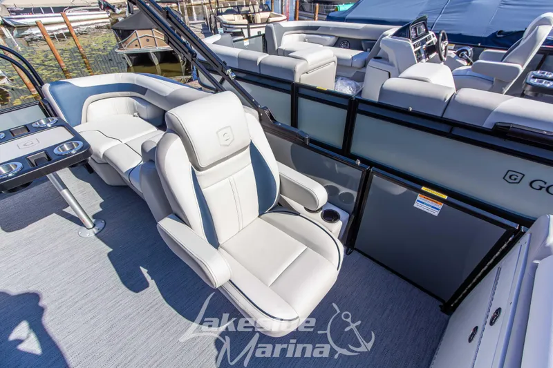 Slide: The Image of 2026 Godfrey Sweetwater 2286 SB boat interior with luxurious seating and modern design. - 12