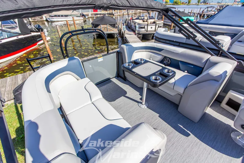 Slide: The Image of 2026 Godfrey Sweetwater 2286 SB pontoon boat with spacious seating and cup holders. - 21