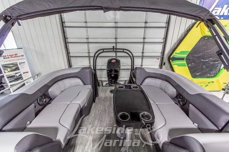 Slide: The Image of 2026 Godfrey Sweetwater 2286 SBC pontoon boat interior with plush seating and modern design. - 23