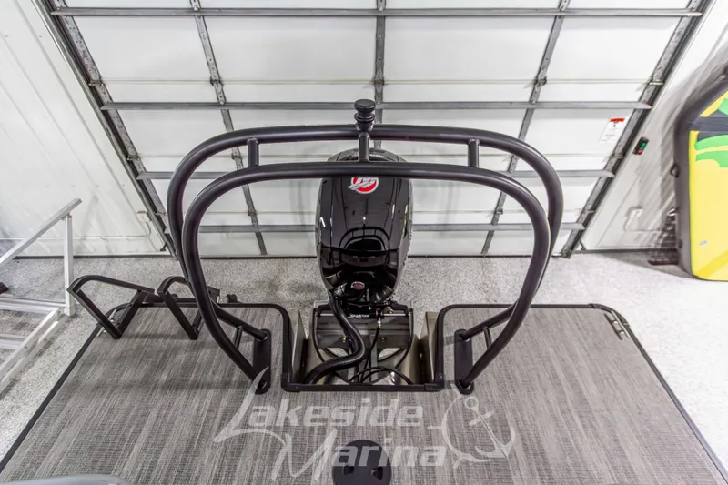 Slide: The Image of 2026 Godfrey Sweetwater 2286 SBC pontoon boat in a garage setting. - 29