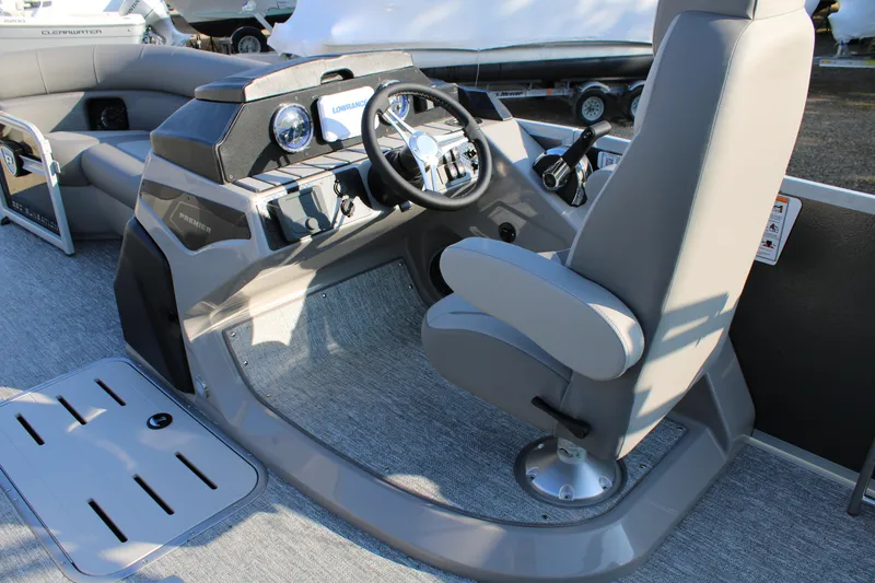 Slide: The Image of 2026 Premier 230 Sunsation RF CL boat helm with modern controls and comfortable seating. - 10