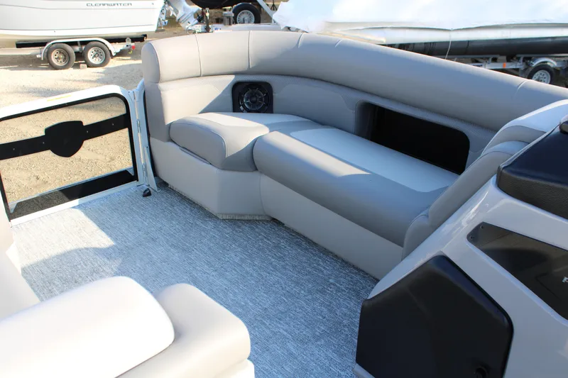 Slide: The Image of Interior of 2026 Premier 230 Sunsation RF CL pontoon boat with gray seating. - 13