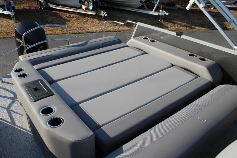 Slide: The Image of 2026 Premier 230 Sunsation RF CL boat with spacious seating and cup holders. - 8