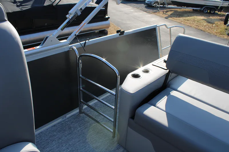 Slide: The Image of 2026 Premier 230 Sunsation RF CL boat interior with seating and ladder. - 9