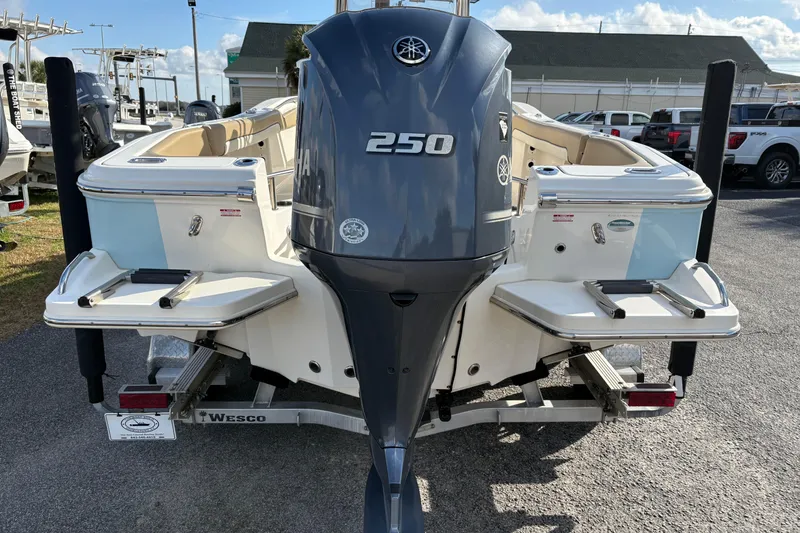 Slide: The Image of 2020 Pioneer 222 Sportfish boat with Yamaha 250 engine, parked on trailer. - 3