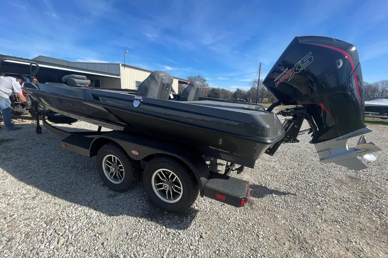 Slide: The Image of 2026 iKon VLX20 boat with Mercury Pro XS engine on a trailer. - 2