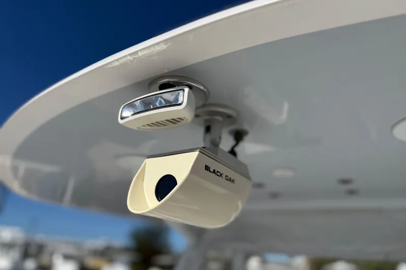 Slide: The Image of 2024 Contender 30 ST boat with Black Oak marine light fixture. - 3