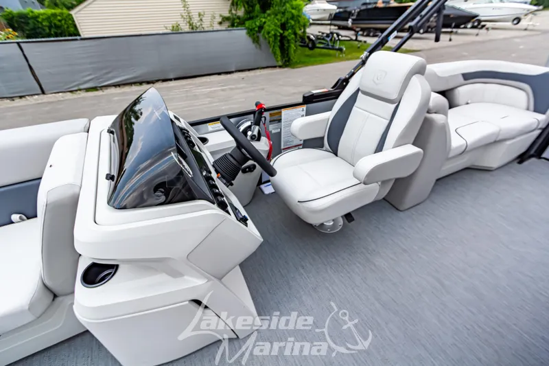 Slide: The Image of 2026 Godfrey Sweetwater 2286 SBC boat interior with modern helm and comfortable seating. - 12