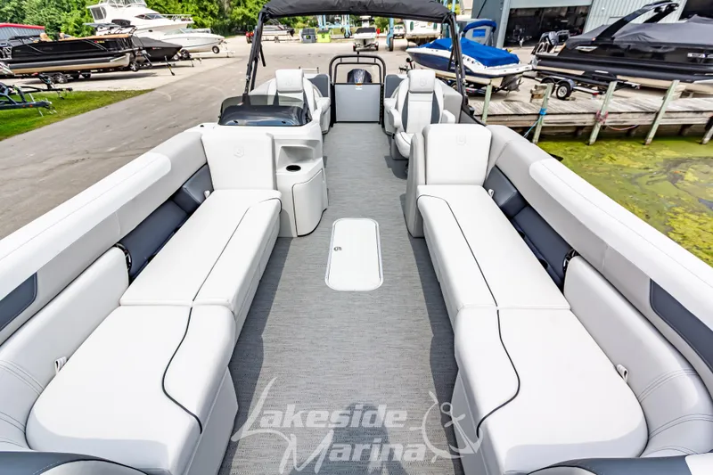 Slide: The Image of 2026 Godfrey Sweetwater 2286 SBC pontoon boat with spacious seating at Lakeside Marina. - 2
