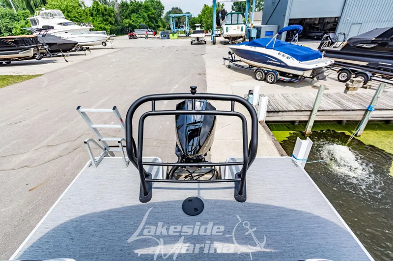 Slide: The Image of 2026 Godfrey Sweetwater 2286 SBC pontoon boat at Lakeside Marina dock. - 21