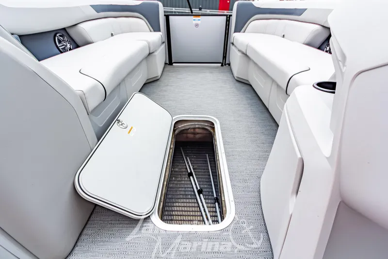 Slide: The Image of 2026 Godfrey Sweetwater 2286 SBC interior with open storage compartment. - 8