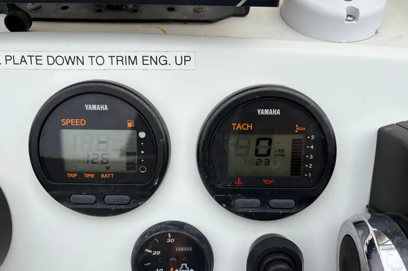 Slide: The Image of Yamaha speed and tachometer gauges on 2017 Action Craft Flatsmaster 1820 boat dashboard. - 15