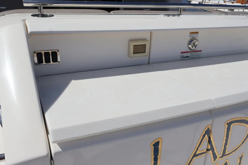 Slide: The Image of 2020 Tiara Yachts C44 Coupe stern detail with control panel and railing. - 24