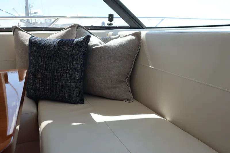 Slide: The Image of Luxurious interior seating with cushions on 2020 Tiara Yachts C44 Coupe. - 35