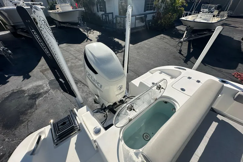 Slide: The Image of 2020 Sea Pro 239 Center Console boat with Suzuki engine and fishing equipment. - 25