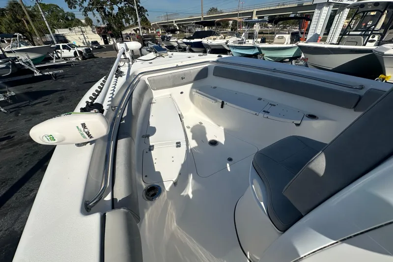 Slide: The Image of 2020 Sea Pro 239 Center Console boat interior with seating and equipment. - 9