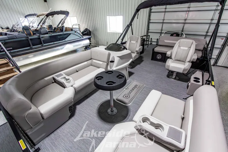 Slide: The Image of Interior of 2026 Godfrey Sweetwater 2286 SFLX pontoon boat with luxurious seating. - 12
