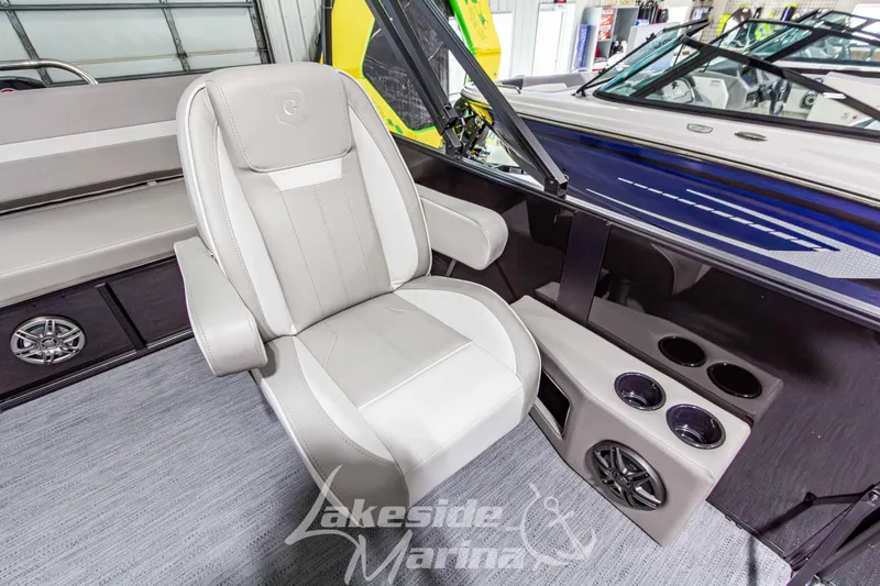 Slide: The Image of 2026 Godfrey Sweetwater 2286 SFLX boat interior with luxury seating and cup holders. - 19
