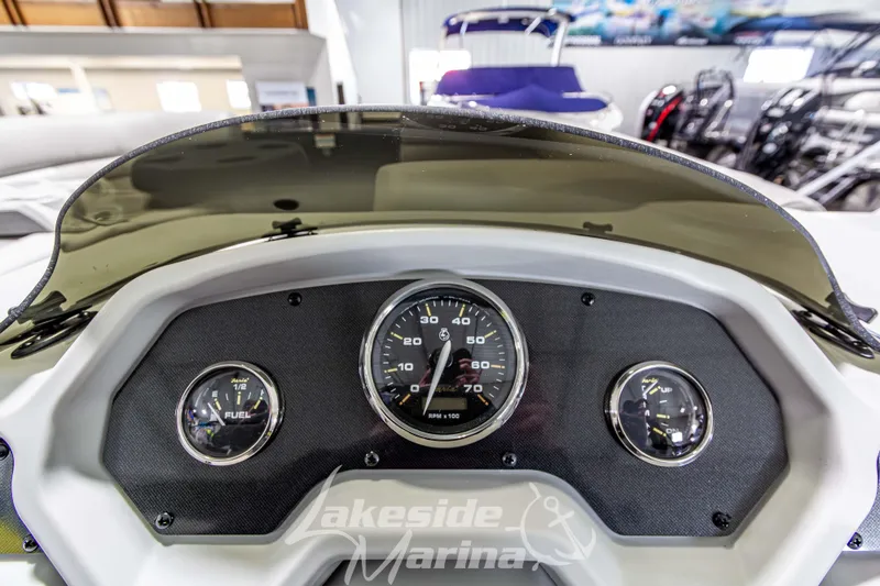 Slide: The Image of Dashboard of 2026 Godfrey Sweetwater 2286 SFLX boat with gauges and windshield. - 23