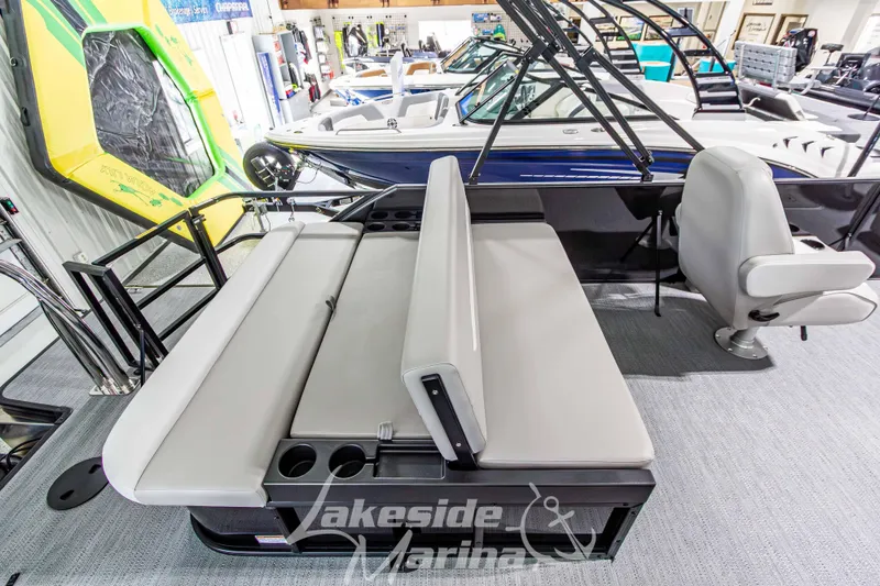 Slide: The Image of 2026 Godfrey Sweetwater 2286 SFLX pontoon boat interior with seating and cup holders. - 26